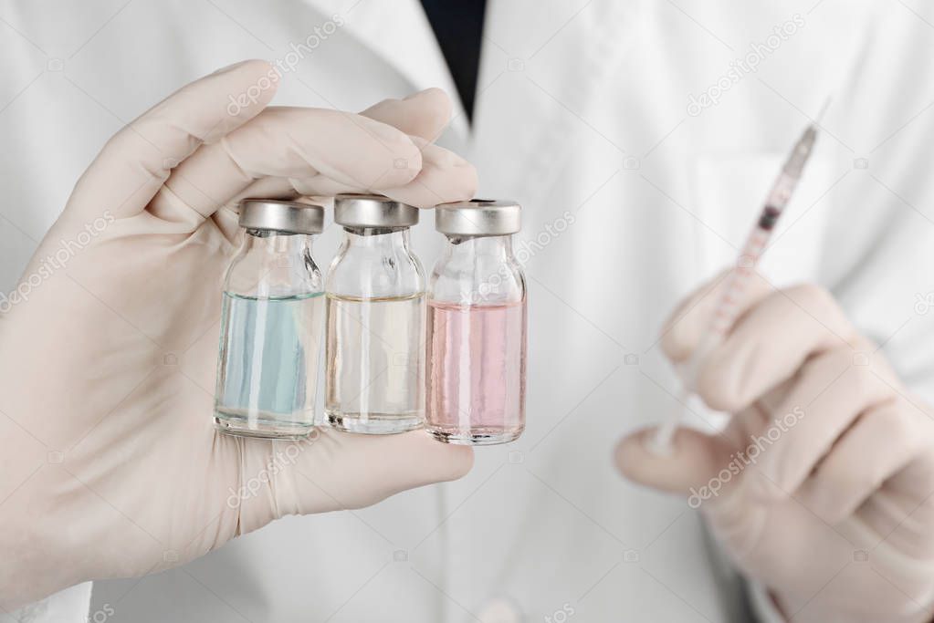Three vials of medicine