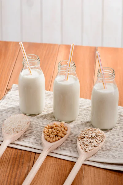 Three bottles of vegan milk