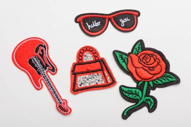 Set of red embroidered patches clipart