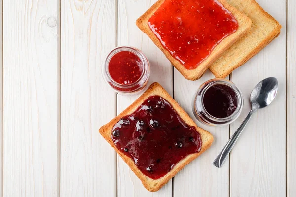 Delicious toasts with homemade jam — Stock Photo, Image