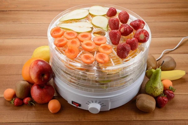 Food dehydrator filled with fruits — Stock Photo, Image