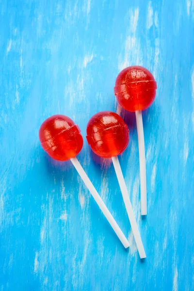 Asymmetric red lollipops minimalism