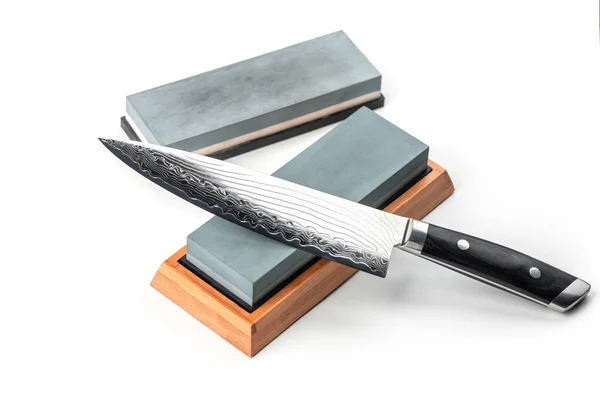 Japanese chefs knife and whetstones isolated on white background — Stock Photo, Image