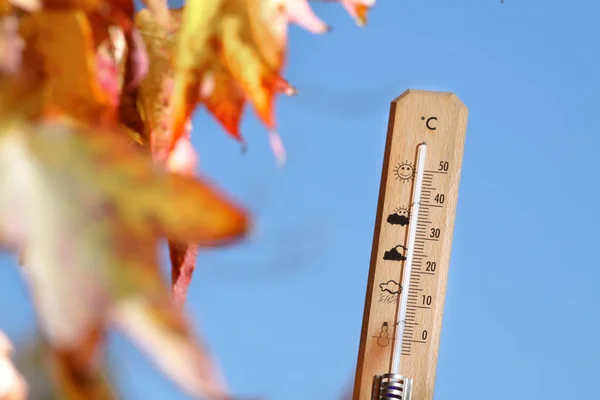 Nice weather in the autumn shown with mercury thermometer — Stock Photo, Image