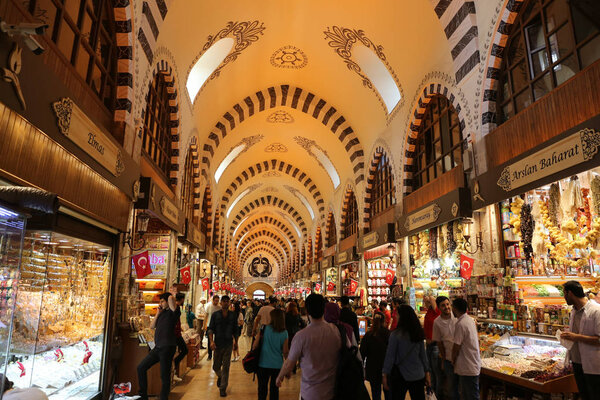 ISTANBUL, TURKEY - MAY 26, 2018: People shopping at Spice Bazaar. The Spice Bazaar is one of the oldest bazaar in Istanbul.