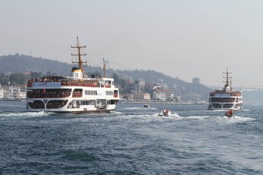 Istanbul, Türkiye - 22 Temmuz 2018: Samsung boğaz çapraz Continental yüzme Yarışması Boğaz boyunca feribot ile başlangıç noktası olacak yüzücüler.