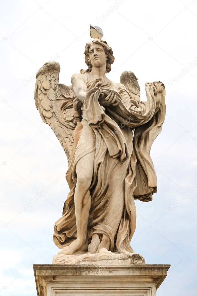Angel with the Garment and Dice Statue in Hadrian Bridge, Rome City, Italy