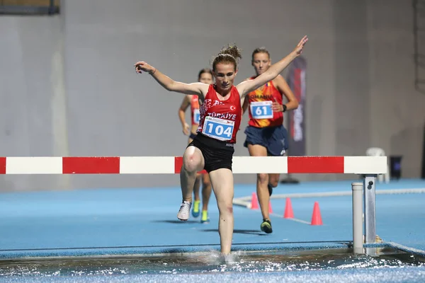 stock image ISTANBUL, TURKEY - SEPTEMBER 12, 2020: Athletes running 3000 metres steeplechase during Balkan U20 Athletics Championships