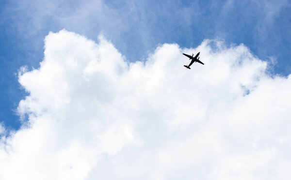 Turbo-propeller plane int the sky