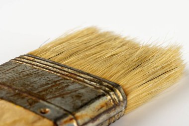Eski paslı boya fırçası, yakın plan.