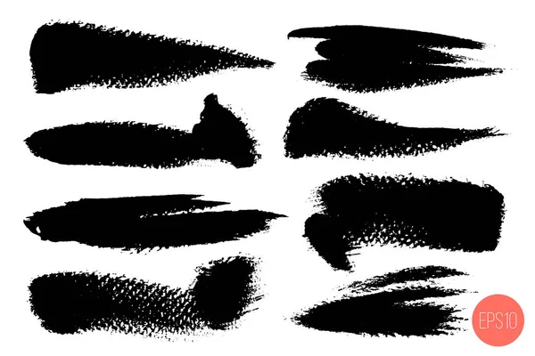 Jeu de coups de pinceau, taches peintes à l'encre noire grunge. Illustration vectorielle . — Image vectorielle