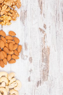 Vitamin içeren besleyici farklı fındık diyet lifi ve doğal mineraller, sağlıklı beslenme kavramı, metin veya yazıt için alan kopyalayın