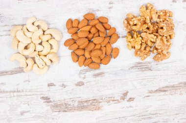 B vitamini ve diyet lifi içeren çeşitli Kuruyemiş kopya mineraller, sağlıklı beslenme kavramı, doğal kaynak metin için yer