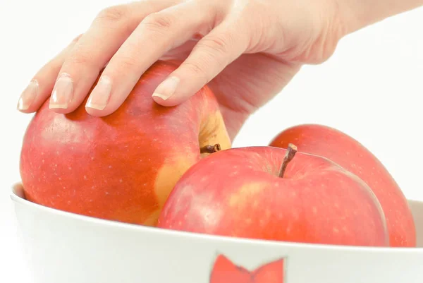 Frauenhand Und Frische Äpfel Auf Weißem Hintergrund Konzept Der Gesunden lizenzfreie Stockbilder