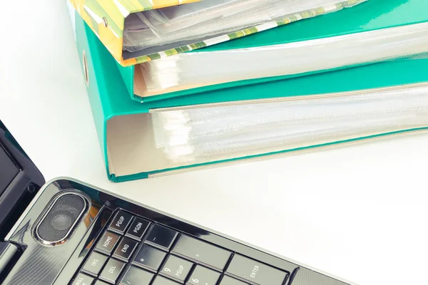 Laptop Computer Colored File Folders Lying White Desk — Stock Photo, Image