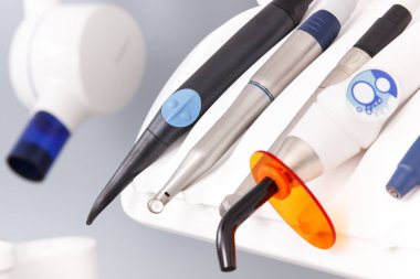 Aletleri, Araçlar, aksesuarları ve modern stomatology ofiste diş hekimleri tarafından kullanmak için diş röntgen cihazı
