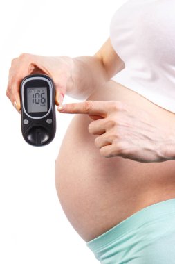 Hamile kadın gösteren şekeri ölçüm cihazı sonuç ölçü Şeker düzeyi, gebelik ve yenidoğan için bekliyor sırasında diyabet kavramı ile