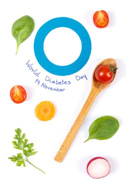 Taze sebze ve Dünya Diyabet Günü ve hastalık, sağlıklı beslenme kavramı mücadele sembolü olarak kağıt mavi daire