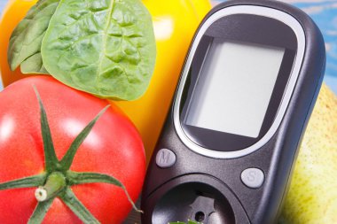 14 Kasım Dünya Diyabet günü kavramı küp takvim, glikoz metre ve taze olgun sebze,'tarihi