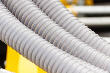 Tarım veya endüstriyel makine, ayrıntı ve hidrolik veya pnömatik aletleri, teknoloji ve mühendislik kavramı parçası plastik oluklu boru