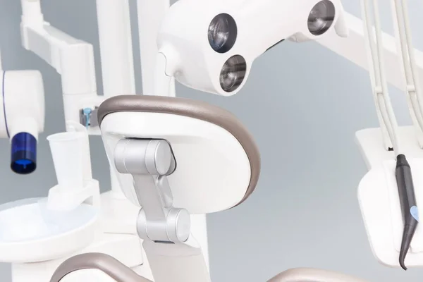 Instruments, tools and dental x-ray machine for using by dentists in modern stomatology office