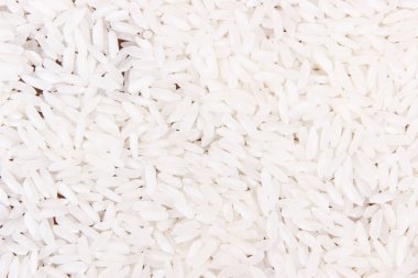 Arka plan, sağlıklı beslenme kavramı olarak beyaz pirinç yığını