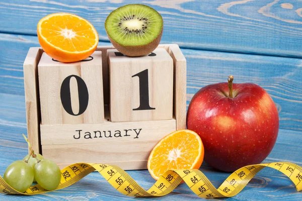 Januar Auf Würfelkalender Frisches Obst Und Maßband Neujahrsvorsätze Für Einen — Stockfoto