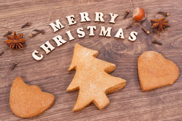 Φρέσκα Ψημένα Γλυκά Γιορτινά Μπισκότα Επιγραφή Καλά Χριστούγεννα Και Μπαχαρικά — Φωτογραφία Αρχείου
