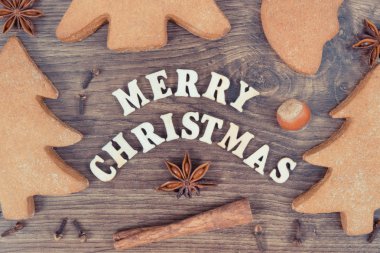 Zencefilli ekmek ya da bayramlık kurabiyeler, yazıtlar Mutlu Noeller ve pişirme malzemeleri. Vintage fotoğraf