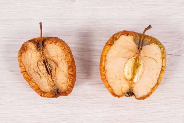 Old Wrinkled Moldy Apple Board Unhealthy Disgusting Eating — Stock Photo, Image