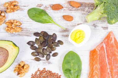 Omega 3 asit, doymamış yağ ve diyet lifleri, sağlıklı beslenme, yaşam tarzı ve asit diyeti konsepti içeren bileşenler