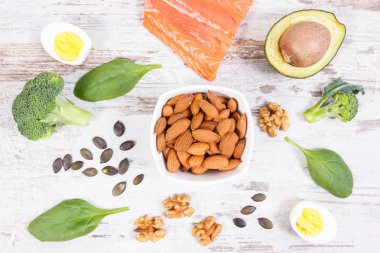 Omega 3 asit, doymamış yağ ve diyet lifleri, sağlıklı beslenme, yaşam tarzı ve asit diyeti konsepti içeren bileşenler