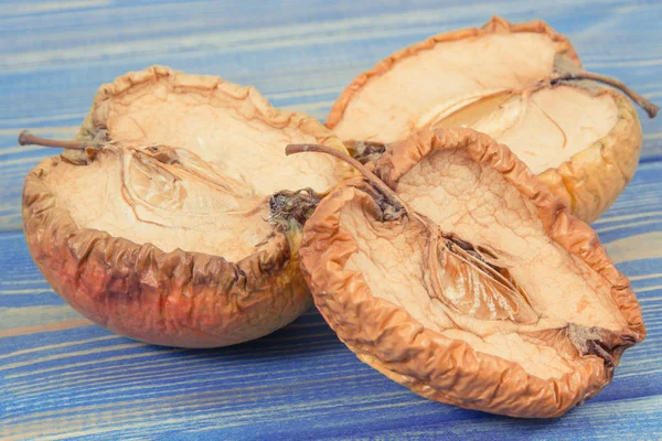 Wrinkled Moldy Disgust Apple Blue Boards Concept Unhealthy Fruit — Stock Photo, Image