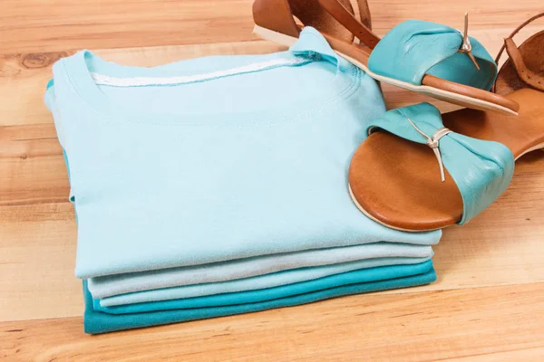 Cotton shirts and leather sandals for woman, casual clothing — Stock Photo, Image