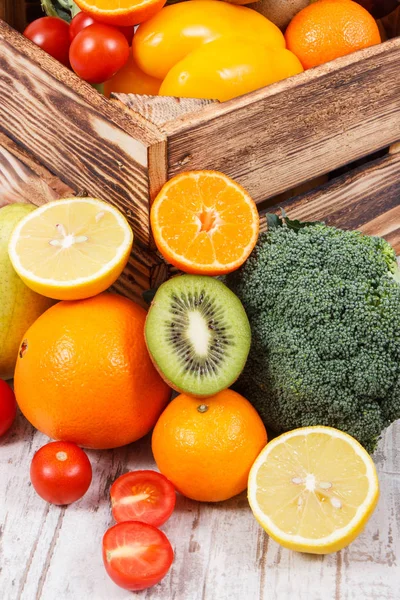 Fresh fruits with vegetables in rustic box as food containing healthy minerals and vitamins — Stock Photo, Image