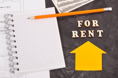 Dolar, notlar ve elektrik diyagramları, ev ya da düz kavramı kiralama için not defteri