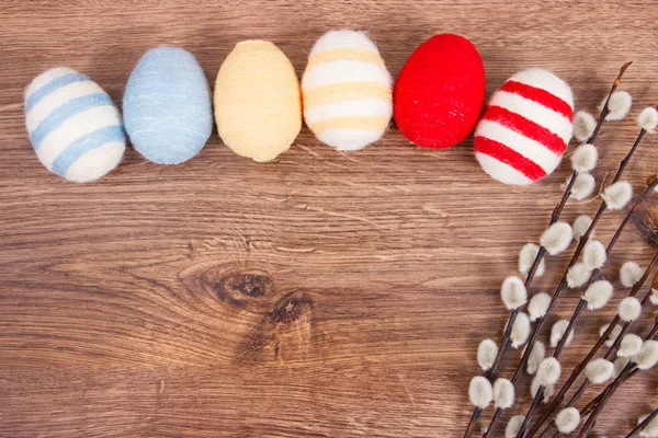 Colorful eggs and Easter catkins as festive decoration, copy space for text — Stock Photo, Image