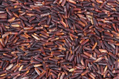 Arka plan, sağlıklı gluten free gıda kavramı olarak siyah pirinç yığını