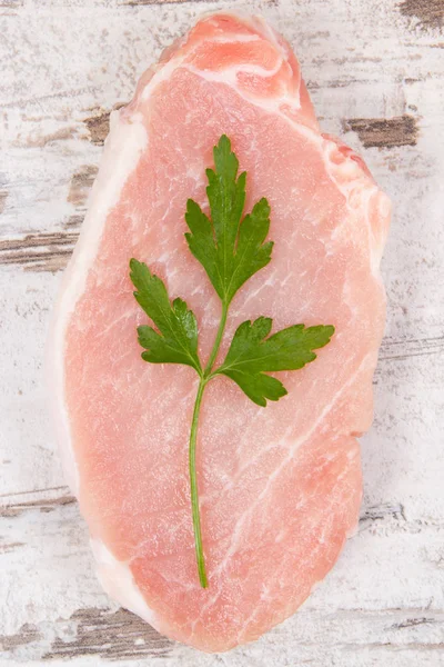Fresh loin with parsley for cooking lunch or dinner — Stock Photo, Image
