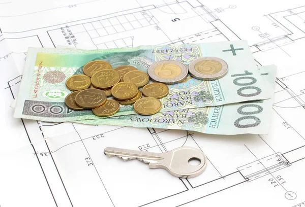 Electrical diagrams with polish money and home key, building home cost concept — Stock Photo, Image