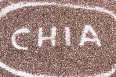 Yazıt chia ve kaynak doğal vitaminler, diyet lifi ve mineraller, sağlıklı beslenme kavramı olarak tohum