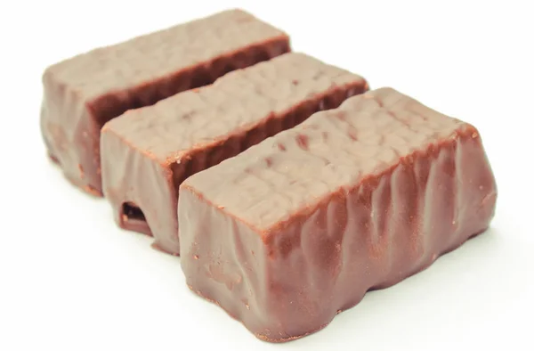 Chocolade snoepjes op witte achtergrond. Zoete dessert — Stockfoto