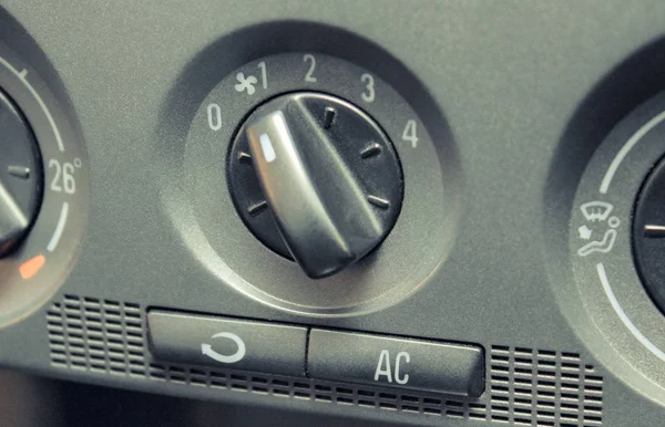 Closeup of air conditioning button in car, regulating speed of incoming airflow — Stock Photo, Image