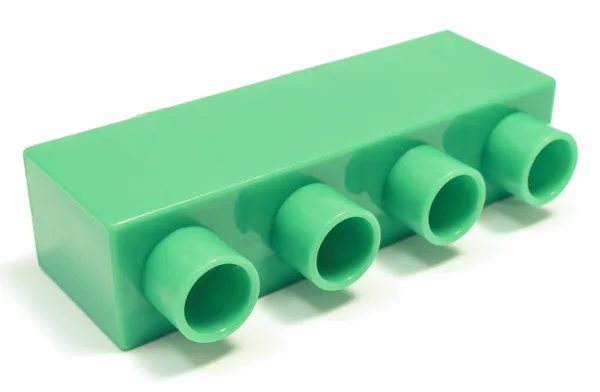 Зеленый блок игрушек для детей на белом фоне . — стоковое фото