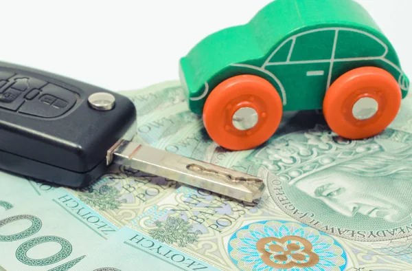 Polish currency money, green toy car and key vehicle. Buying or selling vehicle — Stock Photo, Image