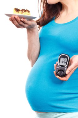 Glikoz metre ve parçası cheesecake, şeker hastalığı ve şeker düzeyi hamilelik sırasında hamile kadın