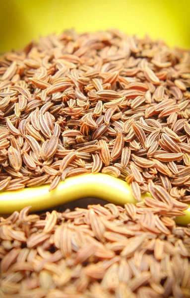 Montón de semillas de comino que contienen minerales saludables — Foto de Stock