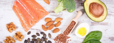 Omega 3 asit, doymamış yağ ve diyet lifleri, sağlıklı beslenme, yaşam tarzı ve asit diyeti konsepti içeren bileşenler