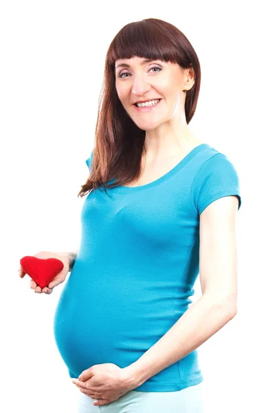 妊娠中の幸せな笑顔の女性と彼女の腹に手 新しい生活の象徴 新生児や家族を拡張するために期待 — ストック写真