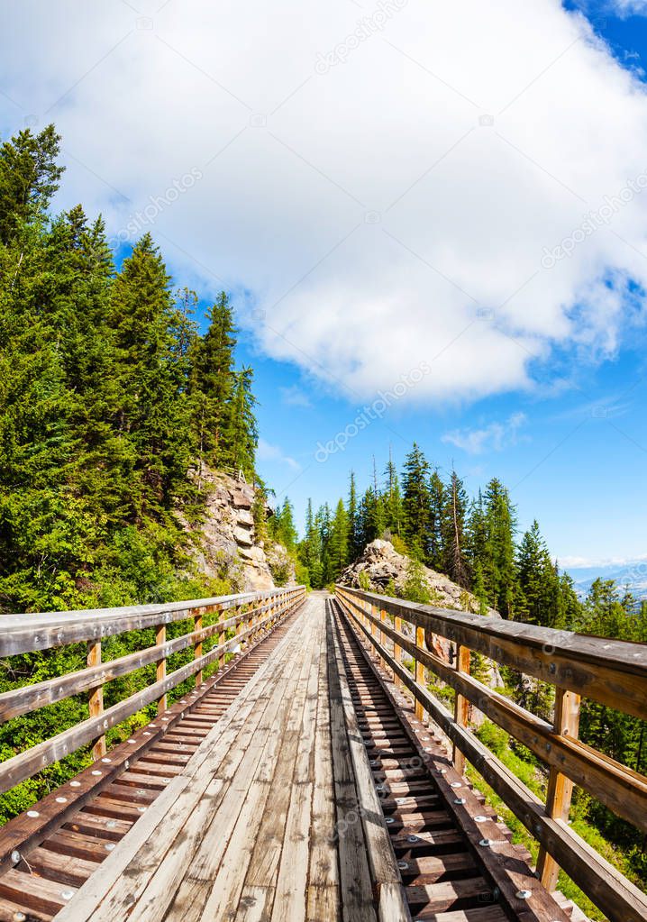 Originally one of 19 wooden railway trestle bridges built in the early 1900s in Myra Canyon, Kelowna, BC, it is now a public park with biking and hiking trails.